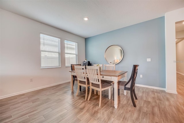 dining area featuring light hardwood / wood-style floors