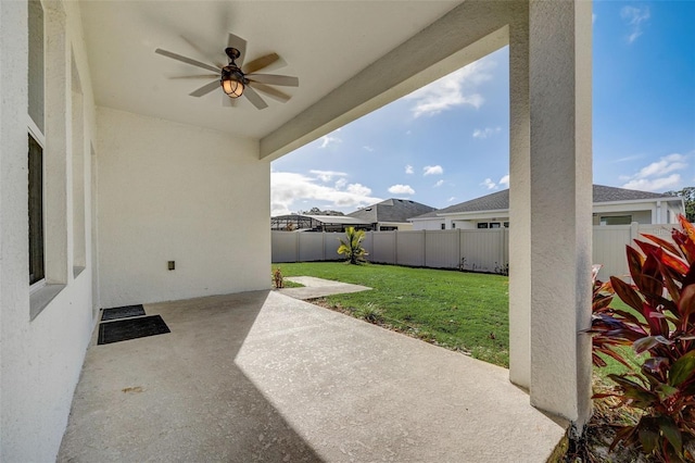 view of patio / terrace featuring ceiling fan