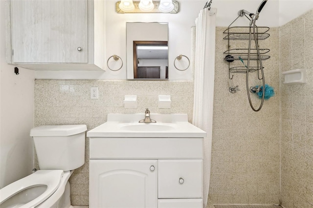 bathroom with tasteful backsplash, a shower with curtain, vanity, tile walls, and toilet