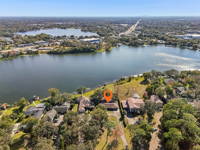 drone / aerial view with a water view