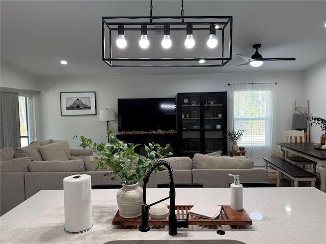 living room with ceiling fan