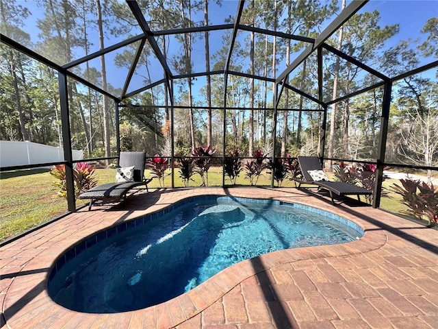 view of pool featuring a lanai and a patio