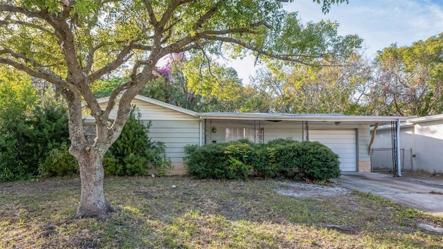 view of side of property with a garage