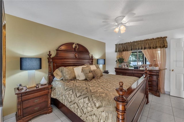 bedroom with light tile patterned floors and ceiling fan