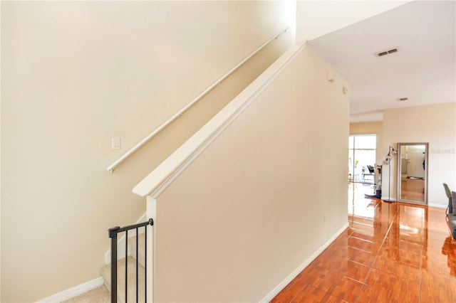 hallway featuring wood-type flooring