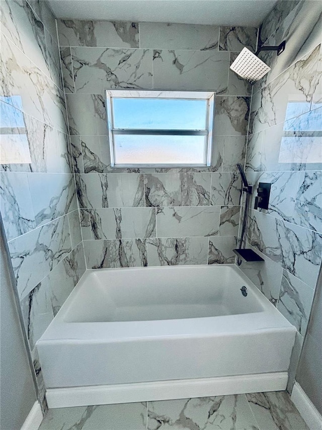 bathroom with shower / tub combination