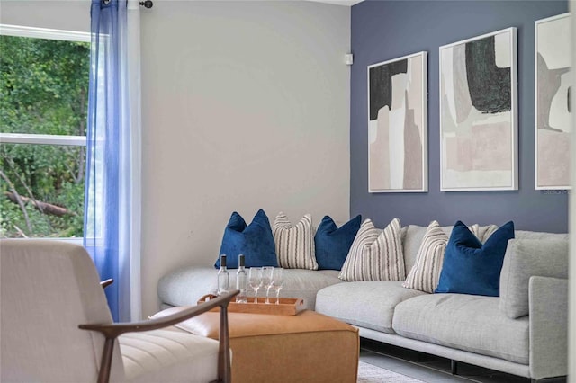 living room with tile patterned floors