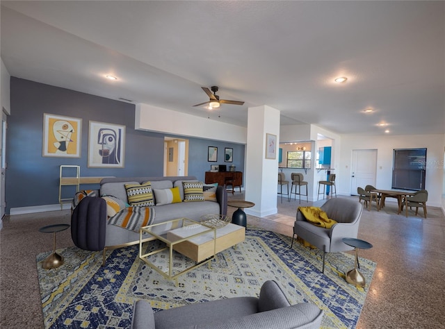 living room with ceiling fan