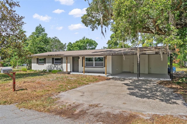 ranch-style house featuring covered porch