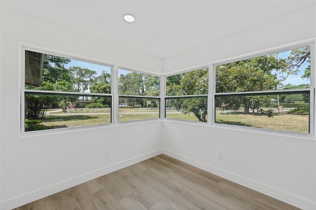 unfurnished sunroom featuring a healthy amount of sunlight