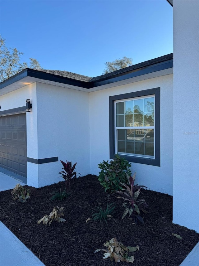 view of home's exterior with a garage