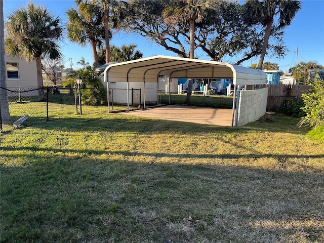 view of car parking featuring a carport and a lawn