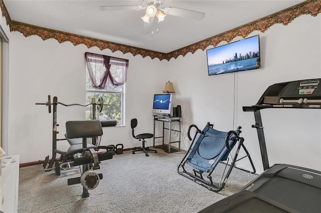 workout room with carpet and ceiling fan