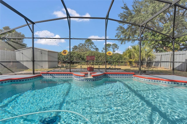 view of swimming pool featuring a lanai