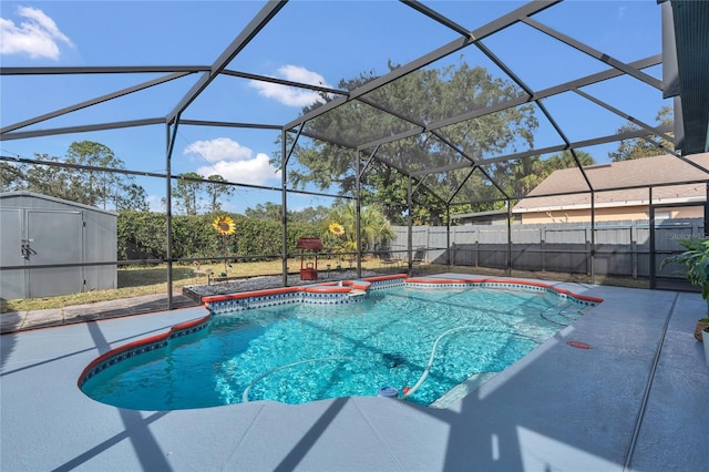 view of pool featuring a storage unit, a lanai, and a patio