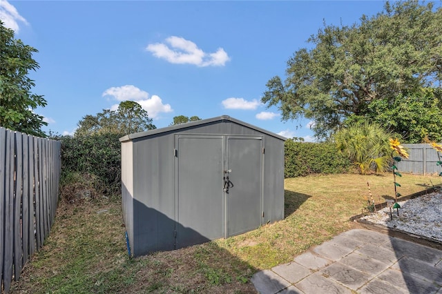 view of outdoor structure with a yard