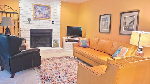 living room with a fireplace and carpet floors