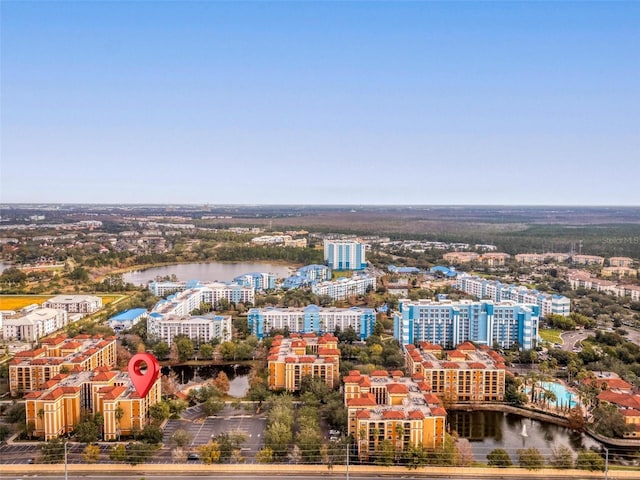 drone / aerial view featuring a water view