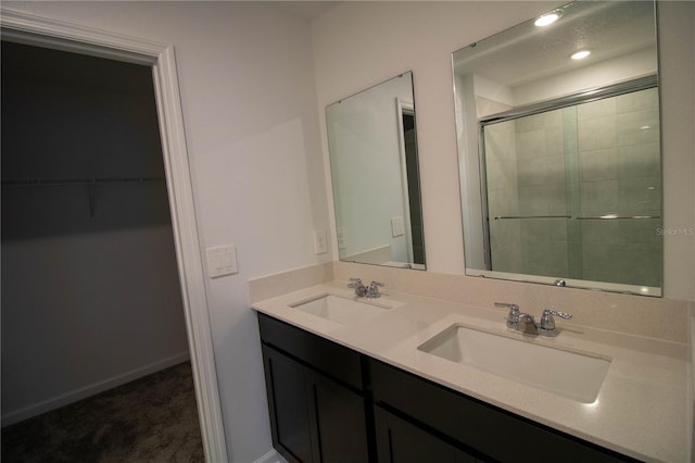 bathroom featuring vanity and walk in shower