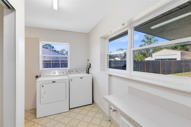 laundry room with separate washer and dryer