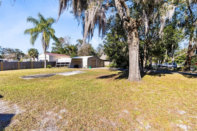 view of yard with a carport