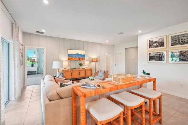 living room with light tile patterned floors