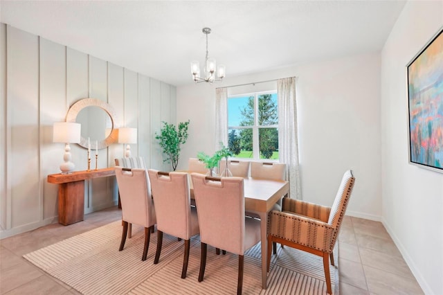 tiled dining area with a notable chandelier