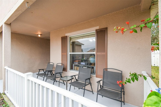 view of patio / terrace with a balcony