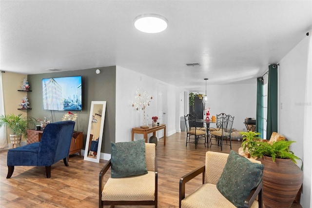 living room with hardwood / wood-style flooring