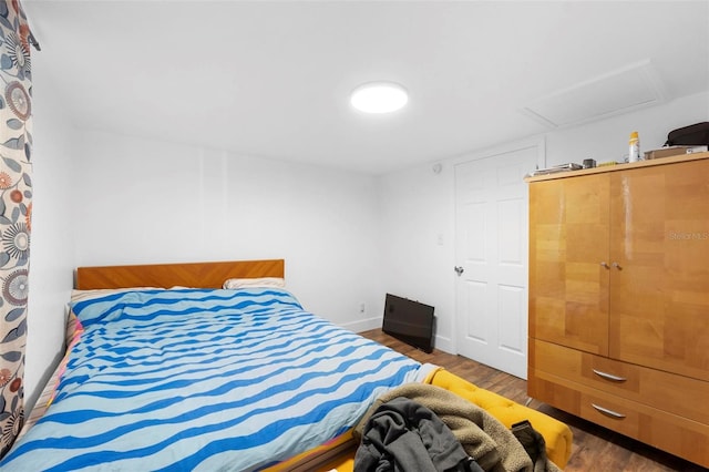 bedroom featuring hardwood / wood-style flooring