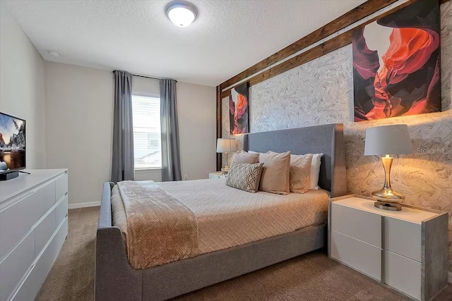 carpeted bedroom featuring a textured ceiling