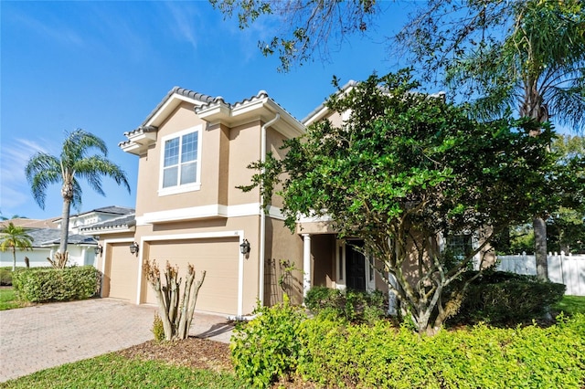 view of front of property with a garage