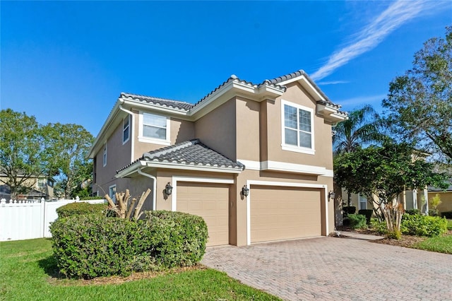 view of front of house with a garage