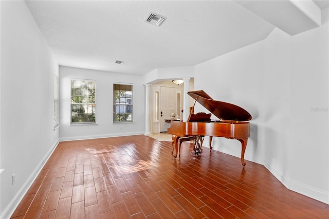 misc room with decorative columns