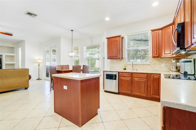 kitchen with decorative backsplash, stainless steel appliances, light tile patterned floors, a kitchen island, and hanging light fixtures