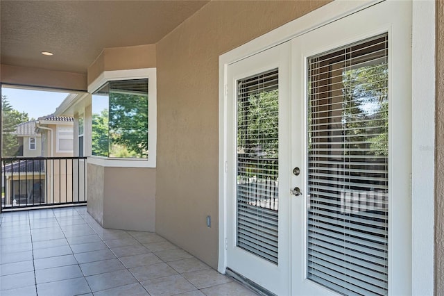 view of exterior entry with french doors