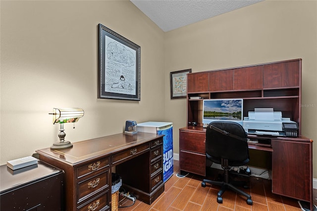 office space with a textured ceiling