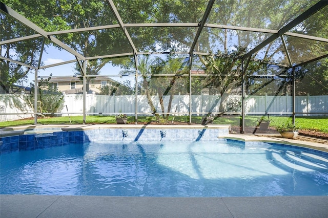 view of pool with a lanai