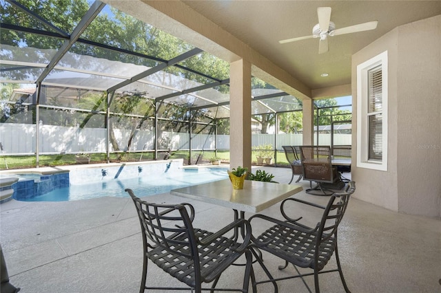 exterior space with a lanai, ceiling fan, and a patio