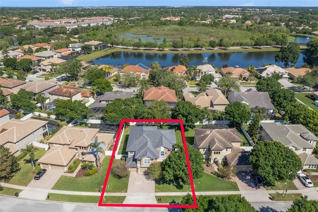 birds eye view of property featuring a water view