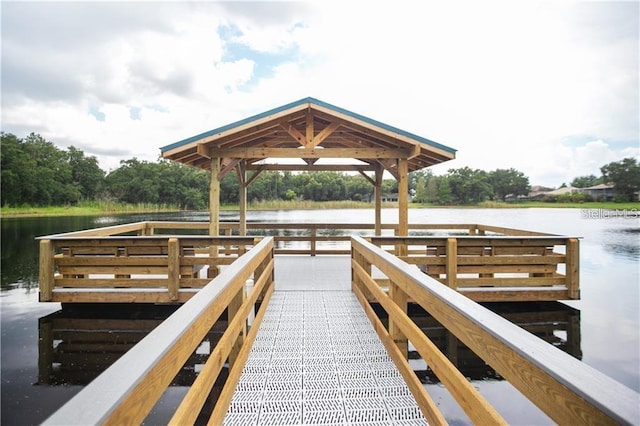 dock area featuring a gazebo and a water view