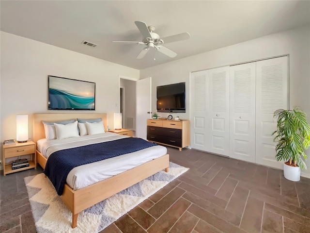 bedroom with a closet and ceiling fan