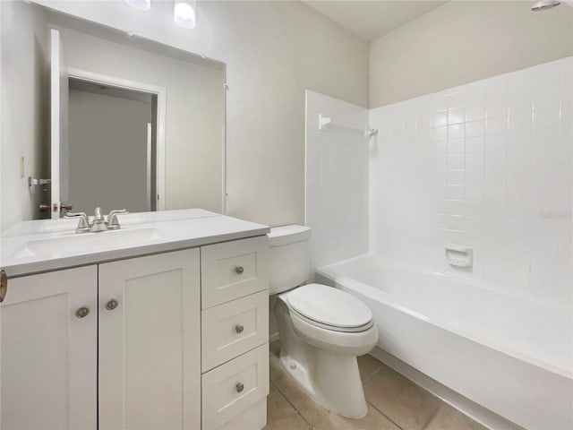 full bathroom featuring tile patterned floors, vanity, tub / shower combination, and toilet