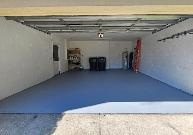 garage featuring water heater