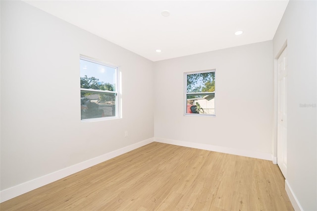 empty room with light wood-type flooring