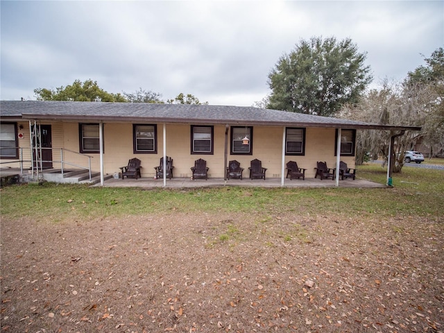 single story home with a patio and a front yard