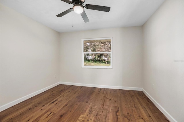 unfurnished room with ceiling fan and hardwood / wood-style floors