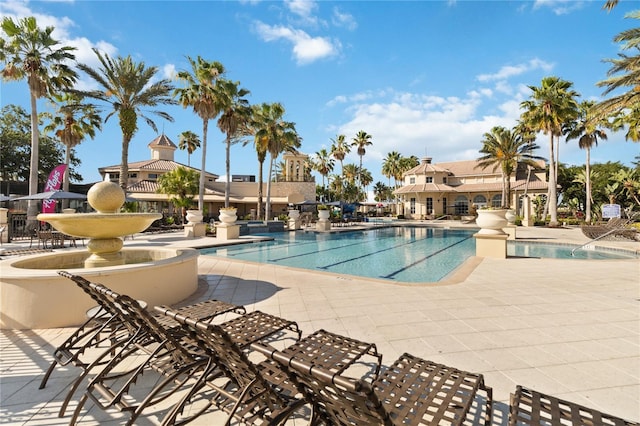 view of swimming pool with a patio area