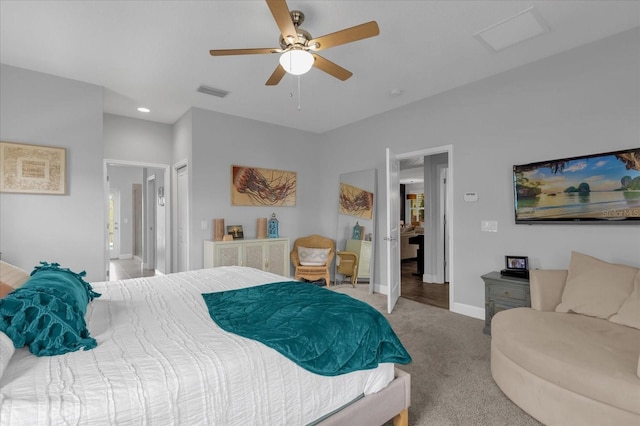 bedroom with light colored carpet and ceiling fan