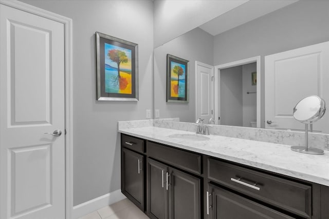 bathroom with vanity and tile patterned floors